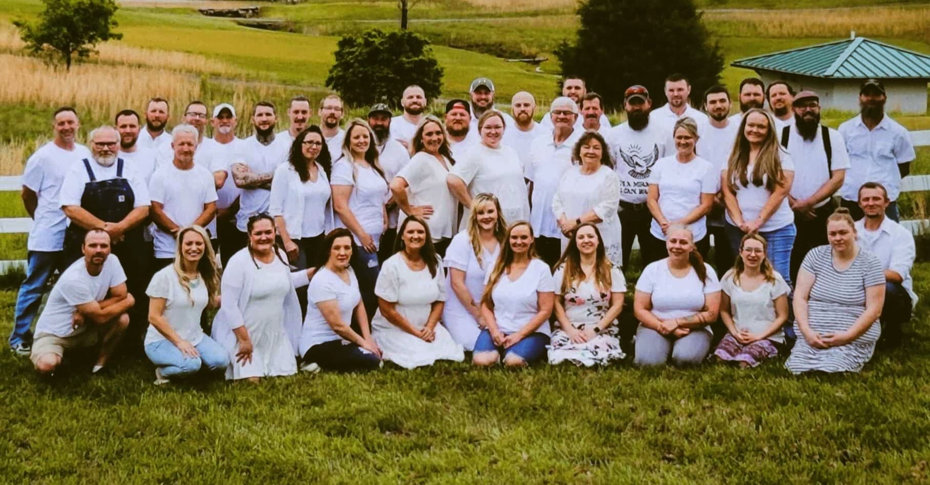 Residents and staff of Butterfly Transformation House
